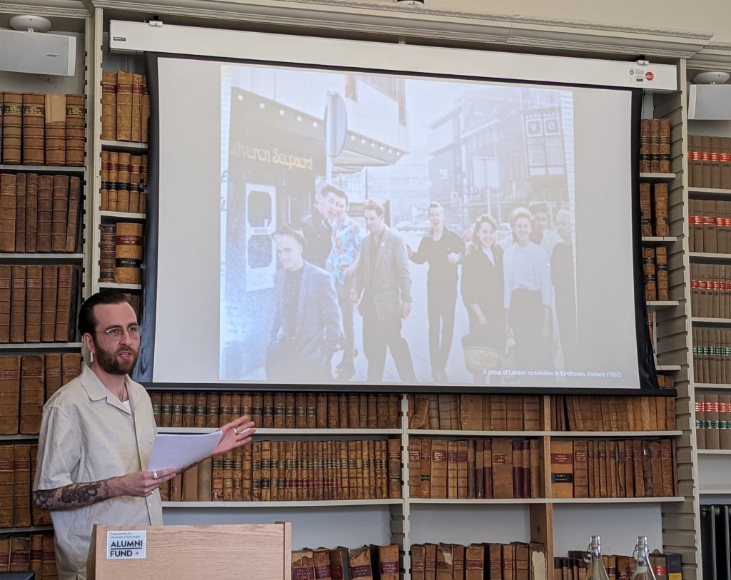 Jake presenting at an academic conference